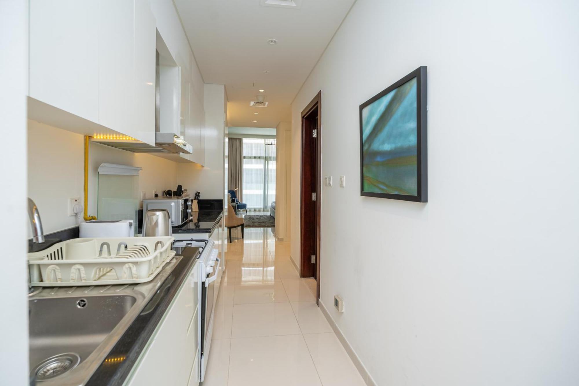 Escape24 Luxury Golf Promenade Damac Hills Apartment Dubai